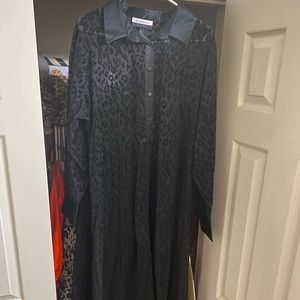 Long sheer leopard dress with satin collar and sleeve trim.